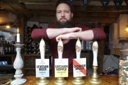 Titsey Brew Co founder Craig Vroom with his beers