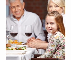 Grand-parents and grand-daughter enjoying a meal out in Hampshire | Local Food Hampshire