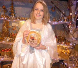 Christmas fairy holding a Real Pie from The Real Pie Co of Crawley